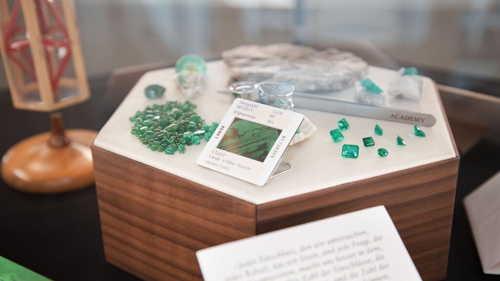 The emerald case is one of many displays in the newly opened Gübelin Gem Museum, which focuses on the creation, origin and appeal of colored gemstones. Gübelin Gem Museum emerald display